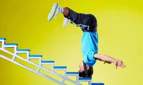 Unbelievable: Man Climbs Stairs with His Head